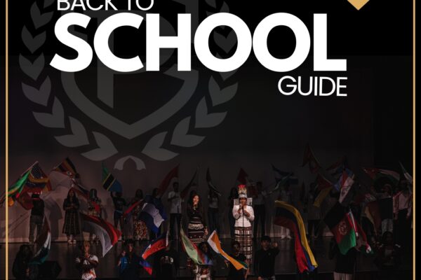 Cover of the Perry Township Schools 2026–2027 Back-to-School Guide featuring students holding international flags on stage beneath the district logo.