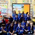 1st grade students getting ready to go on their filed trip