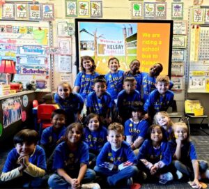 1st grade students getting ready to go on their filed trip