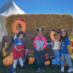 Students with pumpkins at the farm