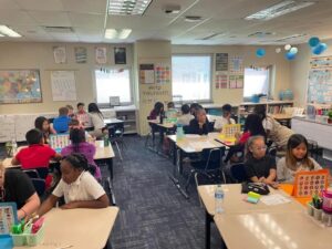 Students working on asking and answering questions