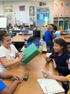 5th grade students working in small groups