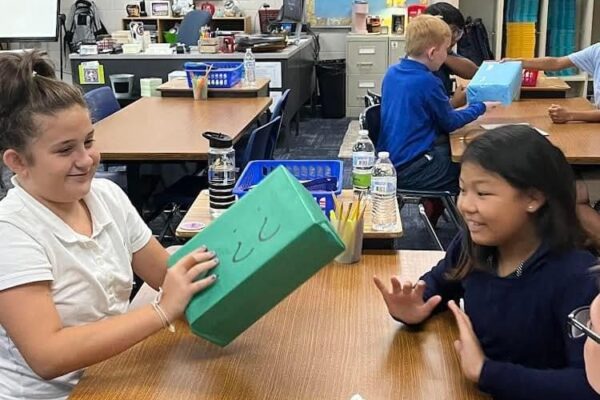 5th grade students working in small groups