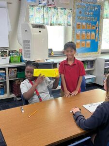 5th grade students working in small groups