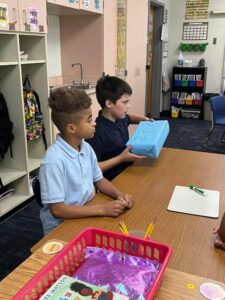 5th grade students working in small groups
