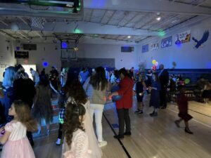 Dancing in the gym at the father-daughter dance