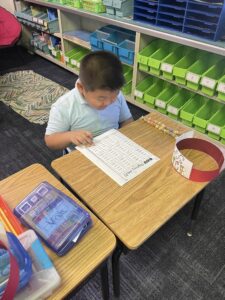 first grader working counting to 100