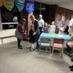 Father and his daughter entering the dance