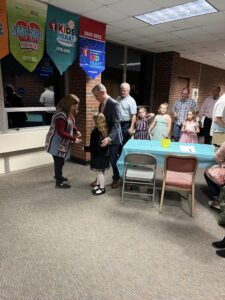 Father and his daughter entering the dance