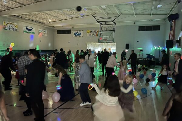 Dancing in the gym at the father-daughter dance