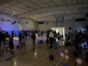 Dancing in the gym at the father-daughter dance