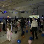 Dancing in the gym at the father-daughter dance