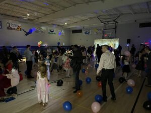 Dancing in the gym at the father-daughter dance