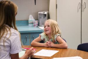 first grade student interviewing for a class job