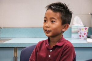 first grade student interviewing for a class job