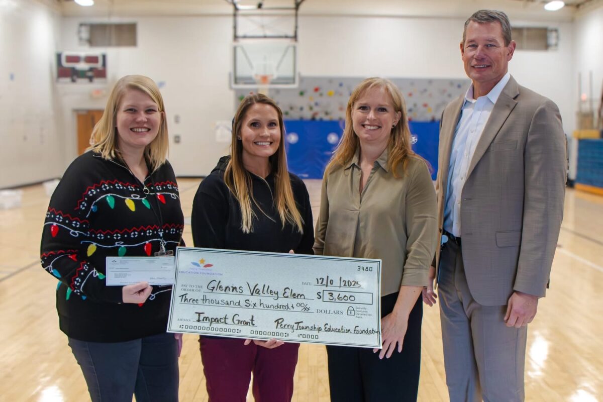 Mrs. Smith and Mrs. Stump accepting the Grant from Mrs. May and Dr. Spray