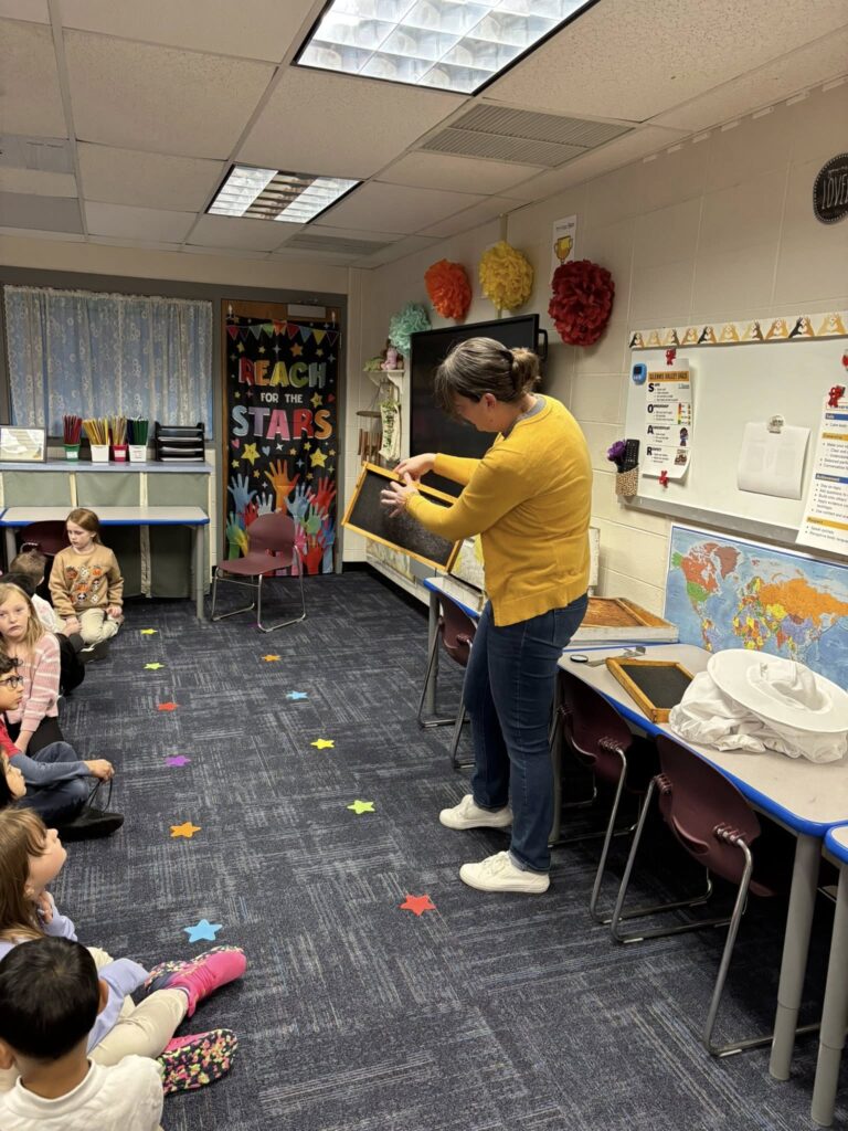Ms. Lee presenting about bees
