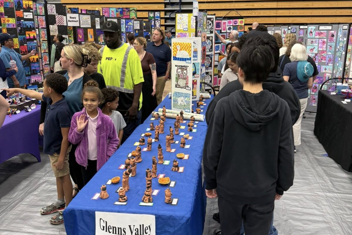Students and families visiting the Perry Township art show