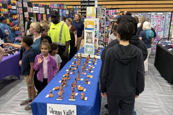 Students and families visiting the Perry Township art show