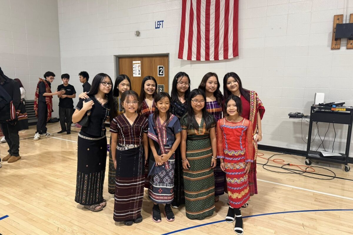 Glenns Valley students and Perry Meridian High School students wearing traditional Chin clothing.