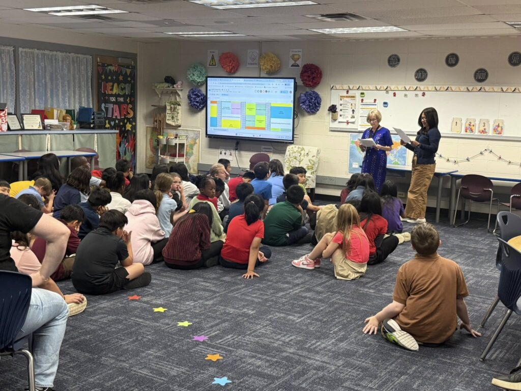 Glenns Valley students listening to guest readers for world cultural day