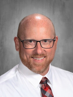 Mr. Eric J. Woodke