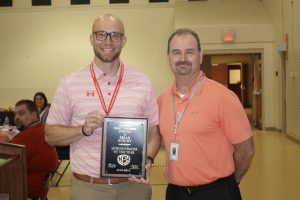 Brian Knight receives 2019 District Administrator Award from Bob Bohannon