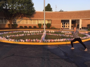 Sara Orme Hughes Standing outside Clinton Young Elementary