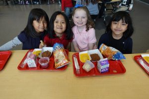 Little girls eating lunch