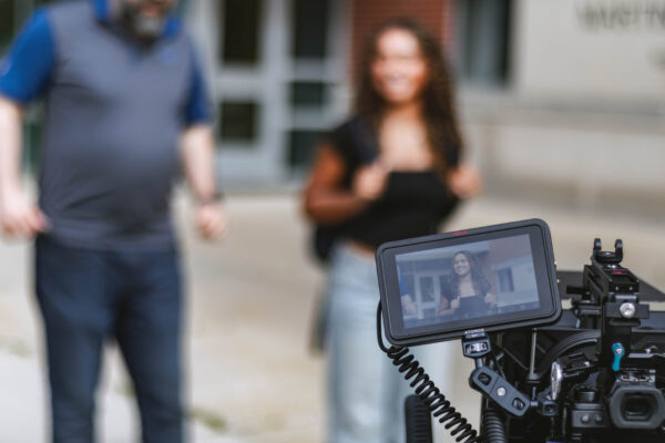 A camera monitor displays a student on the University of Indianapolis campus during filming for Perry Township Schools' Innovation & Entrepreneurship Program.