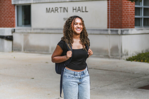 A Perry Township Schools student stands outside Martin Hall on the University of Indianapolis campus, where the Innovation & Entrepreneurship Program will launch this fall.