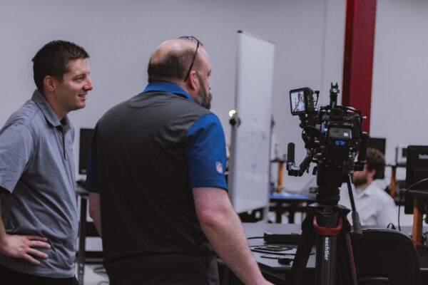 Behind the scenes, partners review footage captured for Perry Township Schools' Innovation & Entrepreneurship Program.