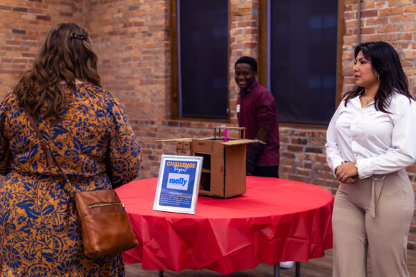 Students showing prototypes to stakeholders