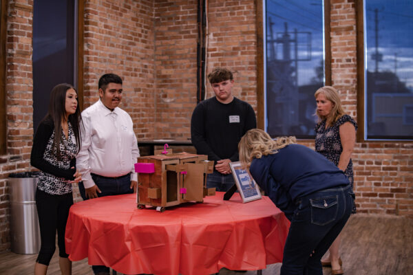 Students showing prototypes to stakeholders