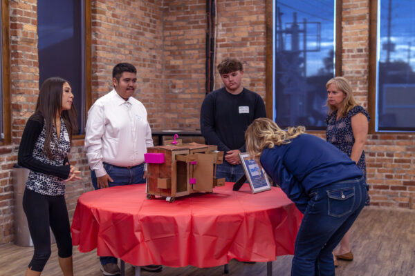 Students showing prototypes to stakeholders