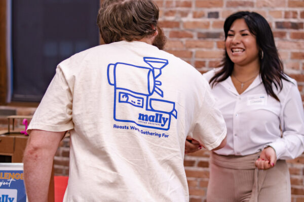 students meeting with business owners