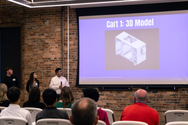 Students showing prototypes to stakeholders