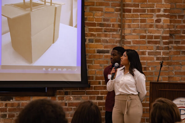 Students showing prototypes to stakeholders